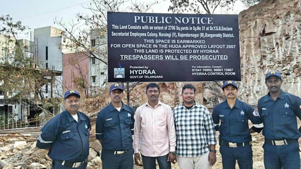 Hydraa officials removing illegal land encroachments in Rangareddy, Telangana.