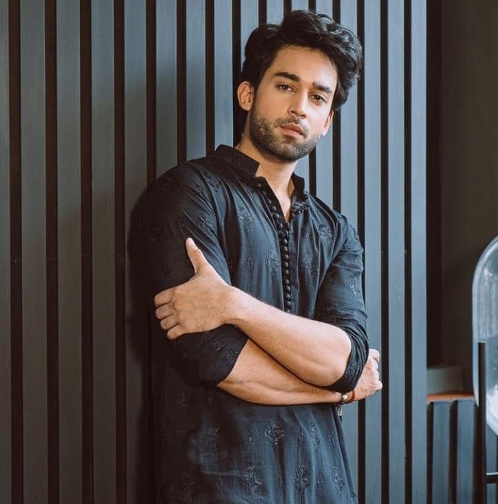 South African cricket player in action during a match, wearing yellow and green team uniform.