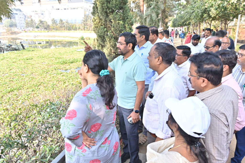 Young couple enjoying outdoor walk in natural setting during autumn.
