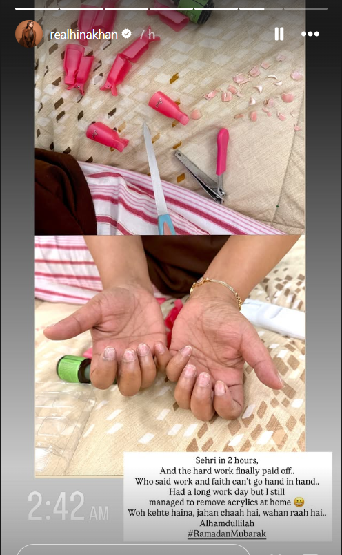 Woman's hands receiving nail care with tools and polish bottles.