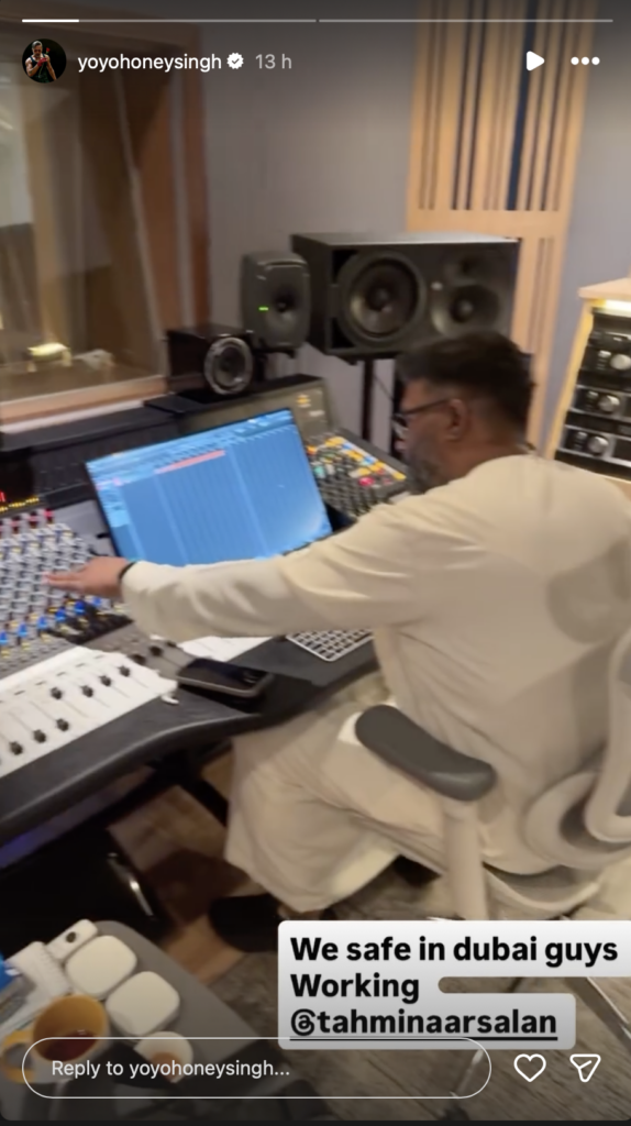 Yo Yo Honey Singh working in Dubai studio, surrounded by professional audio equipment, during a recording.