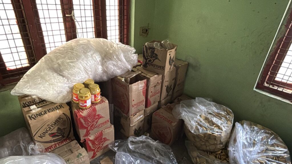 Seized ginger paste in plastic bags and boxes in Hyderabad related to adulteration case.