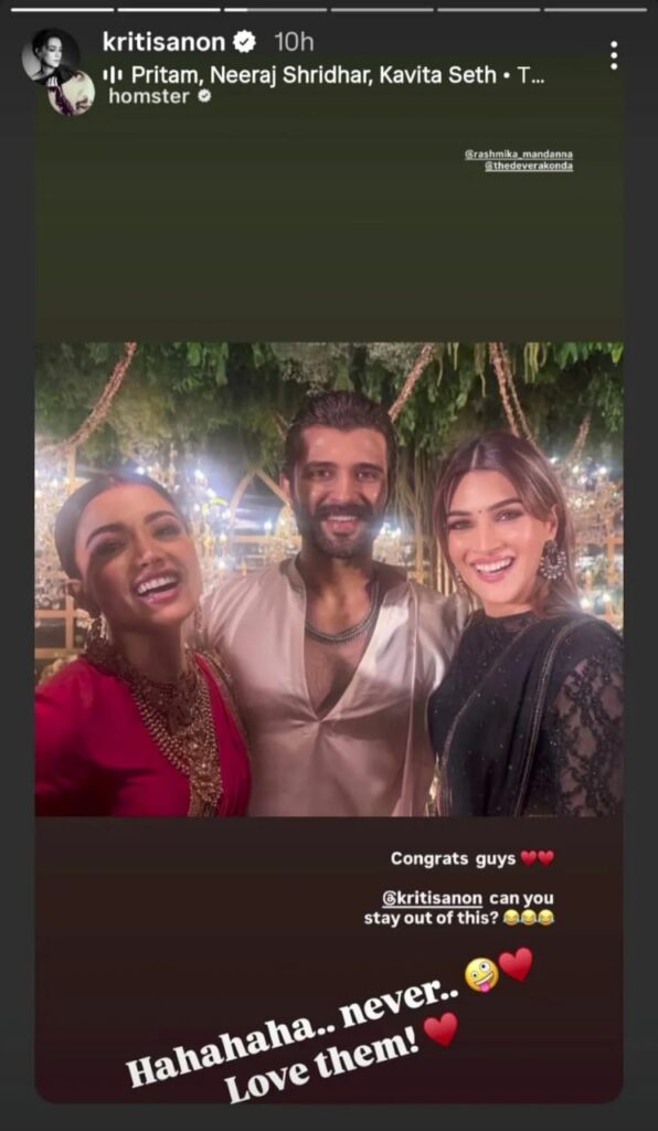 Group of three friends smiling and enjoying a night out, illuminated by string lights.
