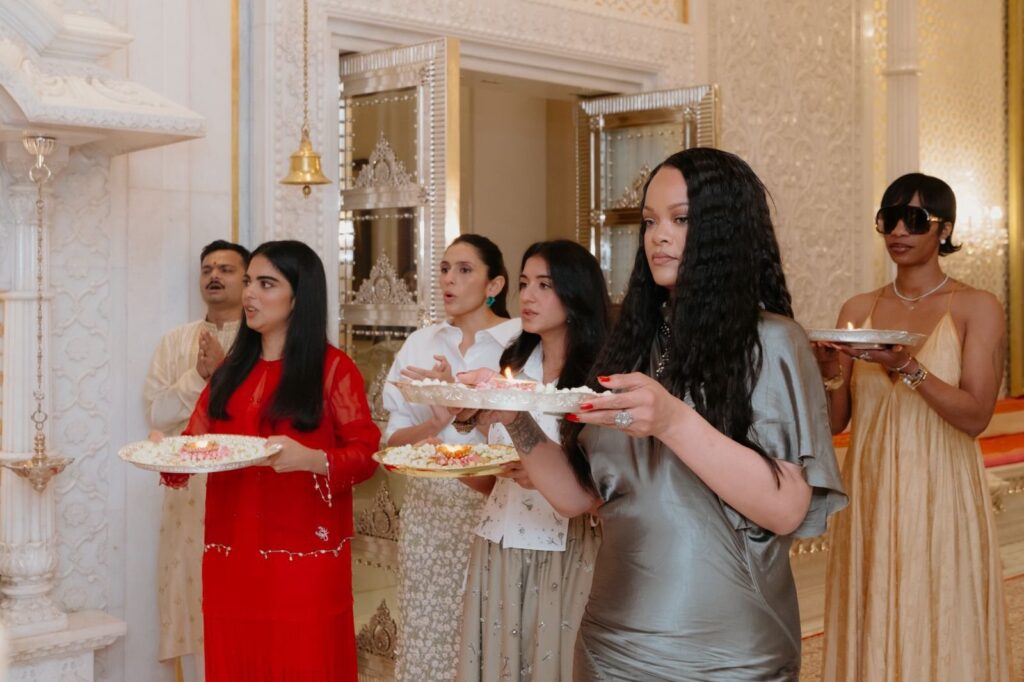 Women in traditional attire participating in a cultural celebration or ceremony.