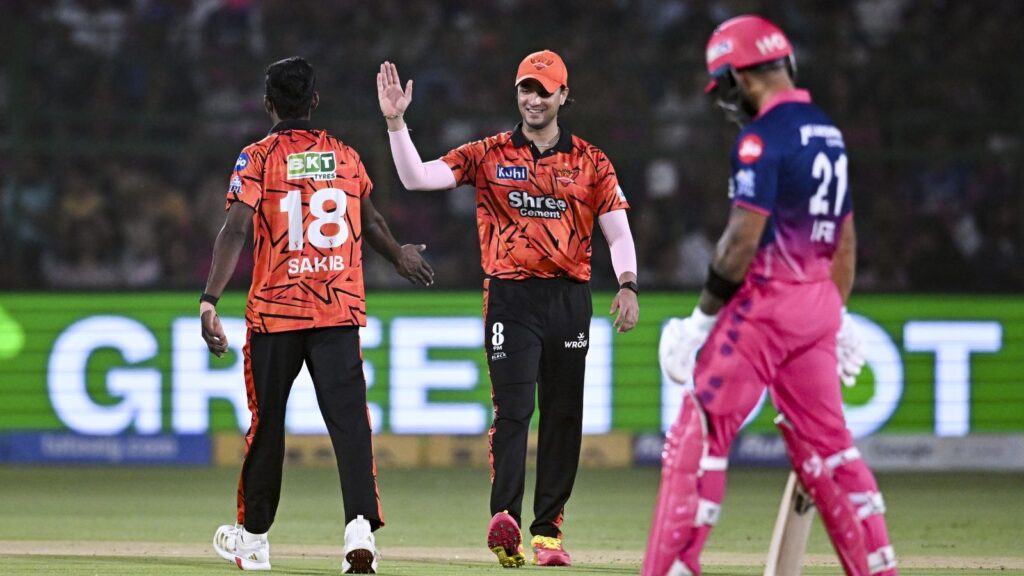 Rajasthan Royals players celebrating a wicket during IPL 2026 match against SRH.