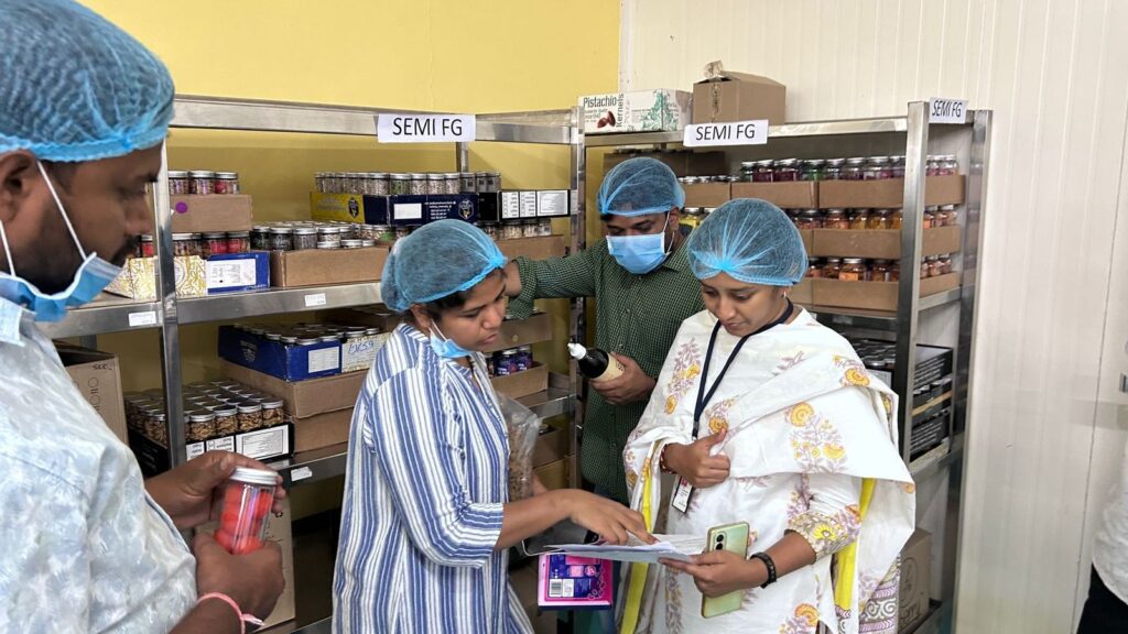 A healthcare team reviewing medication labels in a pharmacy setting.